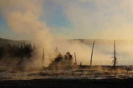 A sunrise in the West Thumb Area in Yellowstone National Parkの写真素材
