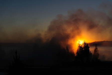 A sunrise in the West Thumb Area in Yellowstone National Parkの写真素材