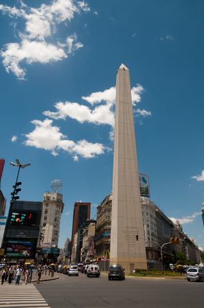 BUENOS AIRES, ARGENTINA, JANUARY 06 2011. Busy traffic near the Obelisco de Buenos Aires. This obelisk is a national Monument and icon of the city of Buenos Airesのeditorial素材