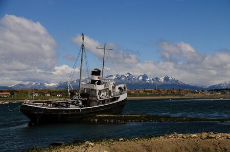 The El remolcador Christofer is an old tug boat stranded near Ushuaias harbourの写真素材
