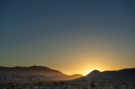 Sunrise over the Hidden Valley Campground area in Joshua Tree National Parkの写真素材