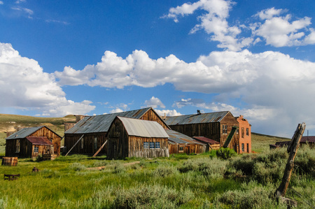 Ruined Buildings in the Californian Ghost Town of Bodie. Bodie is one of the best preserved Ghost Towns in America and was founded during the Californian Gold Rush. It was inhabited until the 1970s.の写真素材