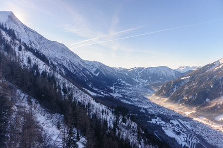 The Mont Blanc and the Valley near Chamonix de Mont Blanc, as seen from the Cable Car to the Aiguille du Midiの写真素材