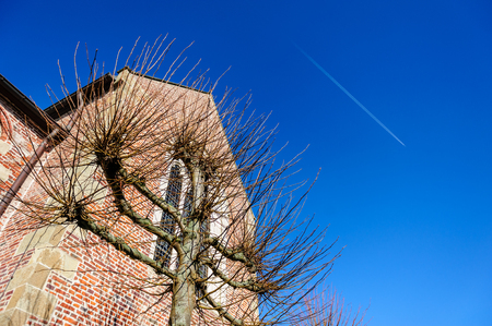 A Classic Church in the Flemish town of Schendelbekeの写真素材