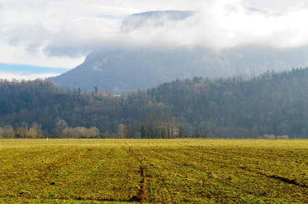 Clouds shrouding the mountains near the town of Entre-deux-Guier, near Eschelles, in the Savoy area in France.の写真素材