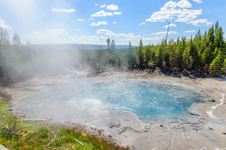 Steamin coming off a geyser in the Norris Geyser Basin in Yellowstone National Parkの写真素材