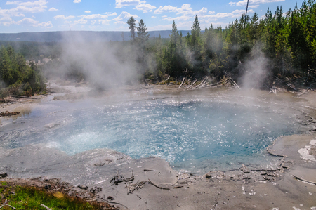 Steamin coming off a geyser in the Norris Geyser Basin in Yellowstone National Parkの写真素材