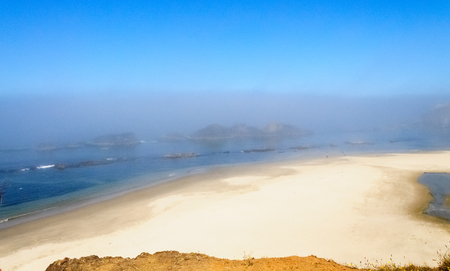 A mist covered beach, near Seal Rock, mid July in Oregon.の写真素材