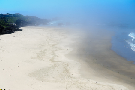 A mist covered beach, near Seal Rock, mid July in Oregon.の写真素材