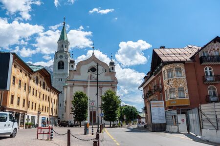 Cortina D Ampezzo, Italy, July 28, 2018. The main church of the City of Cortina DAmpezzo in the the Italian Dolomites. This city is a popular tourist destination among europeans.のeditorial素材