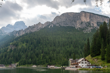 Imression of the buildings along the shoreline of Lake Misurina, in the Italian Dolomites, on a Summers Afternoon.の写真素材
