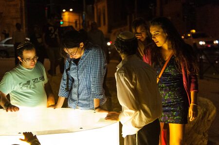 Jerusalem, Israel. June 9, 2013. Close-up of people attending the Light Festival in Jerusalem.