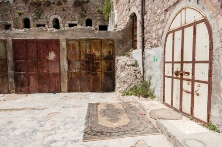 Hebron, Palestina. June 07, 2013. Impression of an old ruined building in the historic city center...
