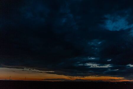 An impressive sky developing near meteor crater along route 66, US interstate 40.の写真素材