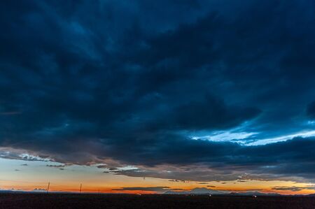 An impressive sky developing near meteor crater along route 66, US interstate 40.の写真素材