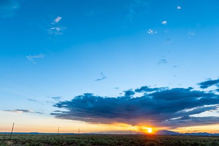 An impressive sky developing near meteor crater along route 66, US interstate 40.の写真素材