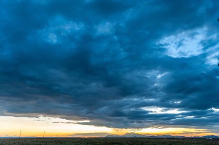 An impressive sky developing near meteor crater along route 66, US interstate 40.の写真素材