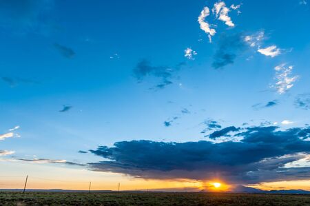 An impressive sky developing near meteor crater along route 66, US interstate 40.の写真素材