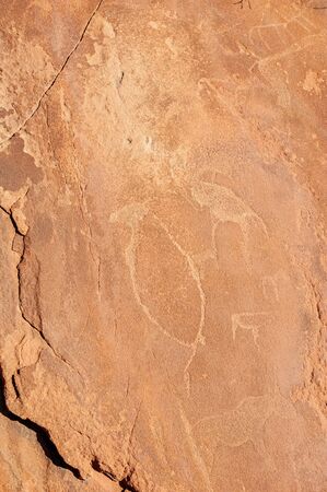 Detail of the prehistoric rock paintings of the San People in Western Namibia, near Twyfelfontein.の写真素材