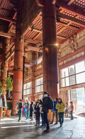 Nara, Japan - January 5, 2020. Visitors experiencing the Todai-ji Temple in Nara. This temple is famous for its giant Buddha statue and a popular tourist destination.のeditorial素材