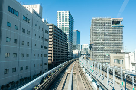 Tokyo, Japan - January 9, 2020. A view from the car of a light rail train in downtown Tokyo.のeditorial素材