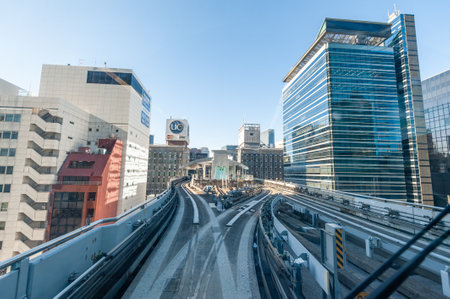 Tokyo, Japan - January 9, 2020. A view from the car of a light rail train in downtown Tokyo.のeditorial素材