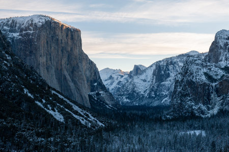 Panoramic view of a snow-covered Yosemite Valley, at Dawn.の写真素材