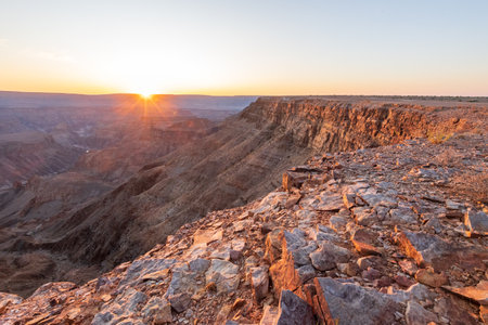 Landscape shot of the sunset over the Fish River Canyon in Southern Namibia.の写真素材