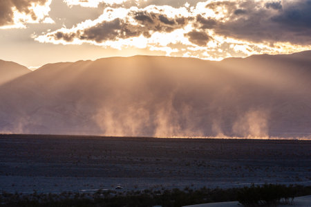 Sunset near the flat sand dunes in Death Valley National Park, California.の写真素材