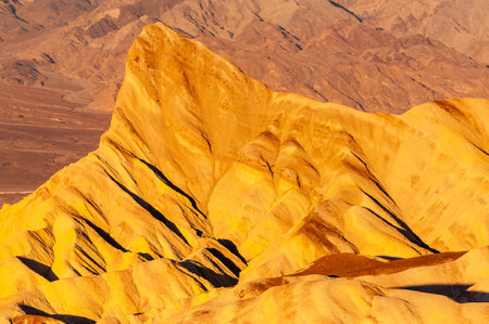 An early morning sunrise at Zabriskie Point, Death Valley, in late December.の写真素材