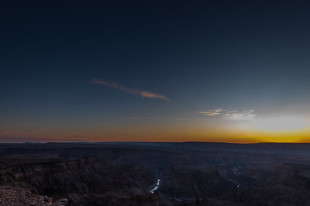 Landscape shot of the sunset over the Fish River Canyon in Southern Namibia.の写真素材