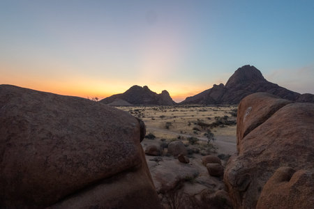 Sunset near Spitzkoppe, a famous granite peak in the center of namibia.の写真素材