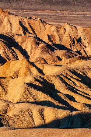 An early morning sunrise at Zabriskie Point, Death Valley, in late December.の写真素材