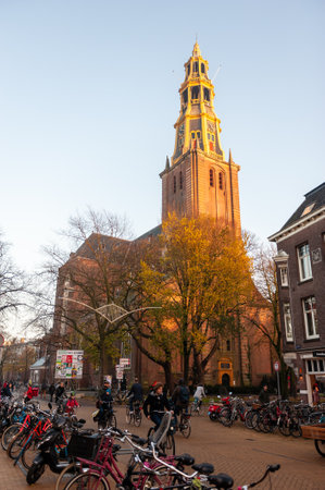 Groningen, the Netherlands - November 16, 2018. The A kerk, a famous church in the Groningen city center, seen here in golden hour light.のeditorial素材