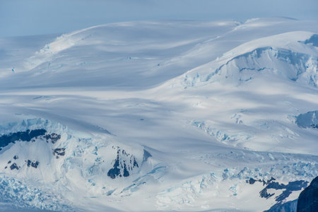 Icebergs and Glaciers align the coast of the Antarctic peninsula, and its many islands. Image taken between Brabant island and Anvers Islandの写真素材
