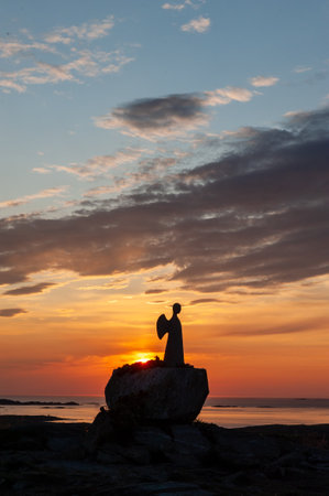 Vallersund, Norway. July 26, 2021. Exterior shot of the Angel of Peace located on a hilltop in Vallersund, Norway. This statue is a symbol of hope and peace.のeditorial素材