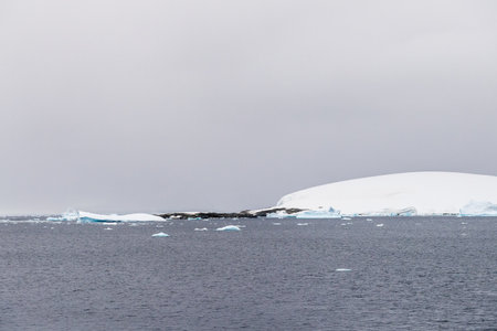 Icebergs and Glaciers align the coast of the Antarctic peninsula, and its many islands. Image taken near the fish Islandsの写真素材