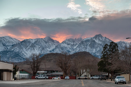Lone Pine, USA - December 27, 2021. A soft glow of the setting sun is hiding behind mt Whitney, the highest point in the continental USA.のeditorial素材