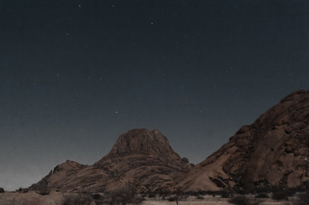 Night shot of the Namibian Desert near Spitzkoppe, under a clear starry southern sky.