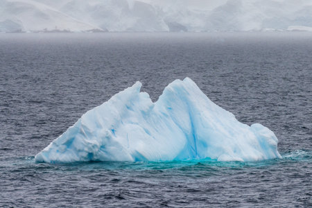 Icebergs and Glaciers align the coast of the Antarctic peninsula, and its many islands. Image taken...