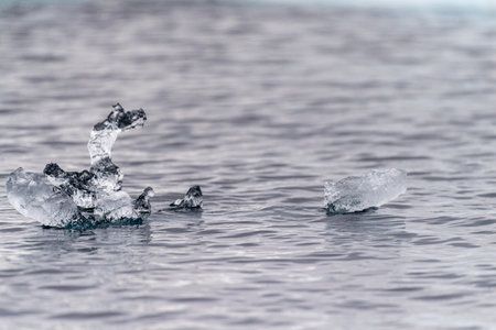 Detail of a patch of Antarctic sea ice, containing wonderous shapes and deep blue colours.の写真素材