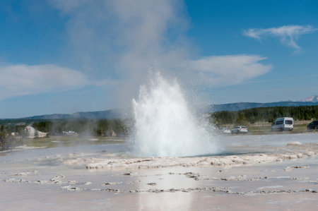 Eruption of the Great Fountain Geyser in Yellowstone National park.の写真素材