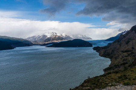 Impressive outlook on Grey Glacier from Paine Grande to Refugio Grey, along lake grey in Torres Del Paine national park, Patagonia, Chile.の写真素材