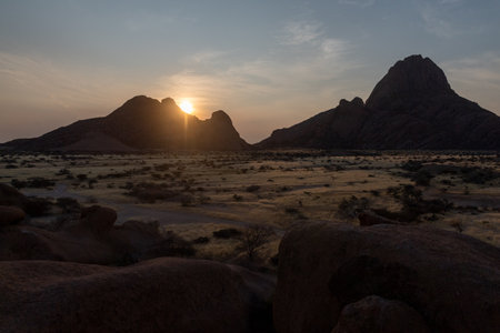 Sunset near Spitzkoppe, a famous granite peak in the center of namibia.の写真素材