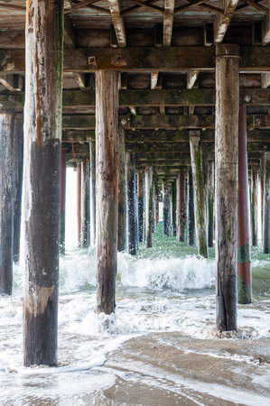 Exterior shot of the wooden support structure that carries the Sea Cliff Pier near Aptos, California.の写真素材