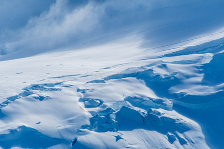 A tranquil Antarctic landscape, near Mikkelsen Harbour on Trinity Island, highlighting stark...