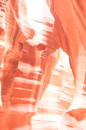 Antelope Canyon: A breathtaking slot canyon in Arizona, Antelope Canyon features winding, narrow passages with stunning, swirling sandstone formations. Known for its ethereal light beams and vibrant red and orange hues, it is a photographers paradise and a popular destination for nature enthusiasts.の写真素材