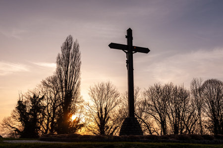 Geraardsbergen, Belgium - April 4, 2021. Outdoor scene showing a crucifix near the Oudenberg chapel, at the top of the famous Muur in Geraardsbergen, in East flanders.のeditorial素材