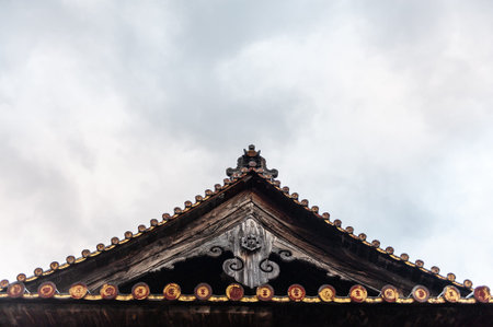 Hatsukaichi, Japan - December 31, 2019. Close-up of the roof of the Senjokaku Pavilion on Miyajima...