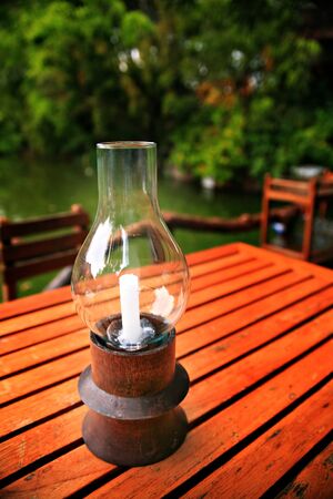 Candlestick made ââof wood laid on the tableの写真素材